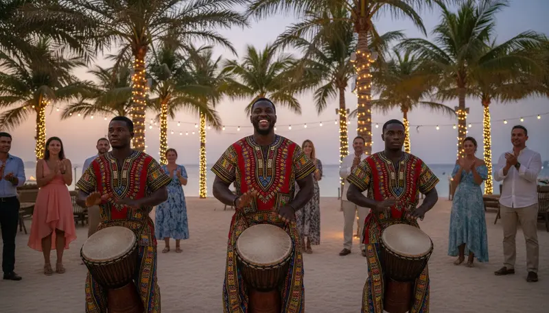 African drummers playing djembe hand drums for smiling guests at an evening event in Dubai