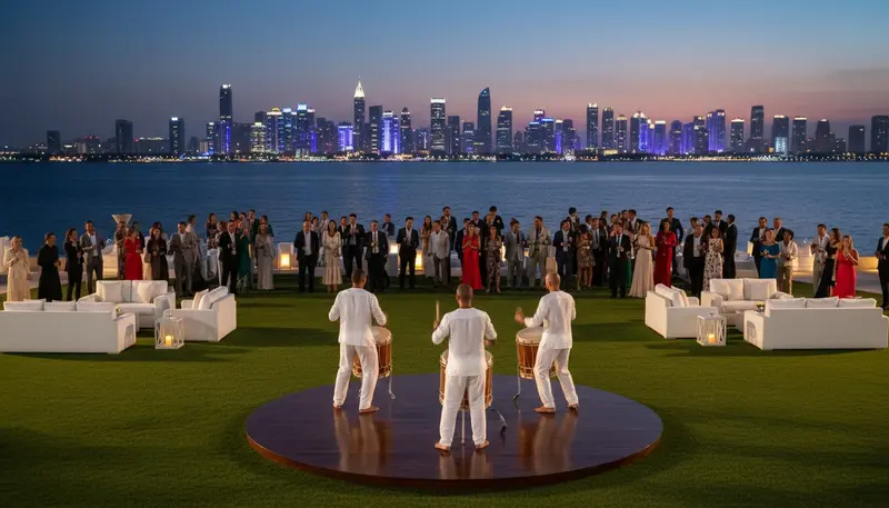 Drummers performing on a waterfront lawn at an evening event in Abu Dhabi